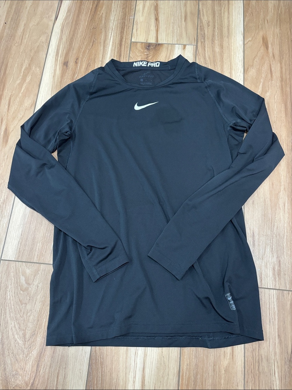 Nike Black Long Sleeve Performance Top with White Swoosh